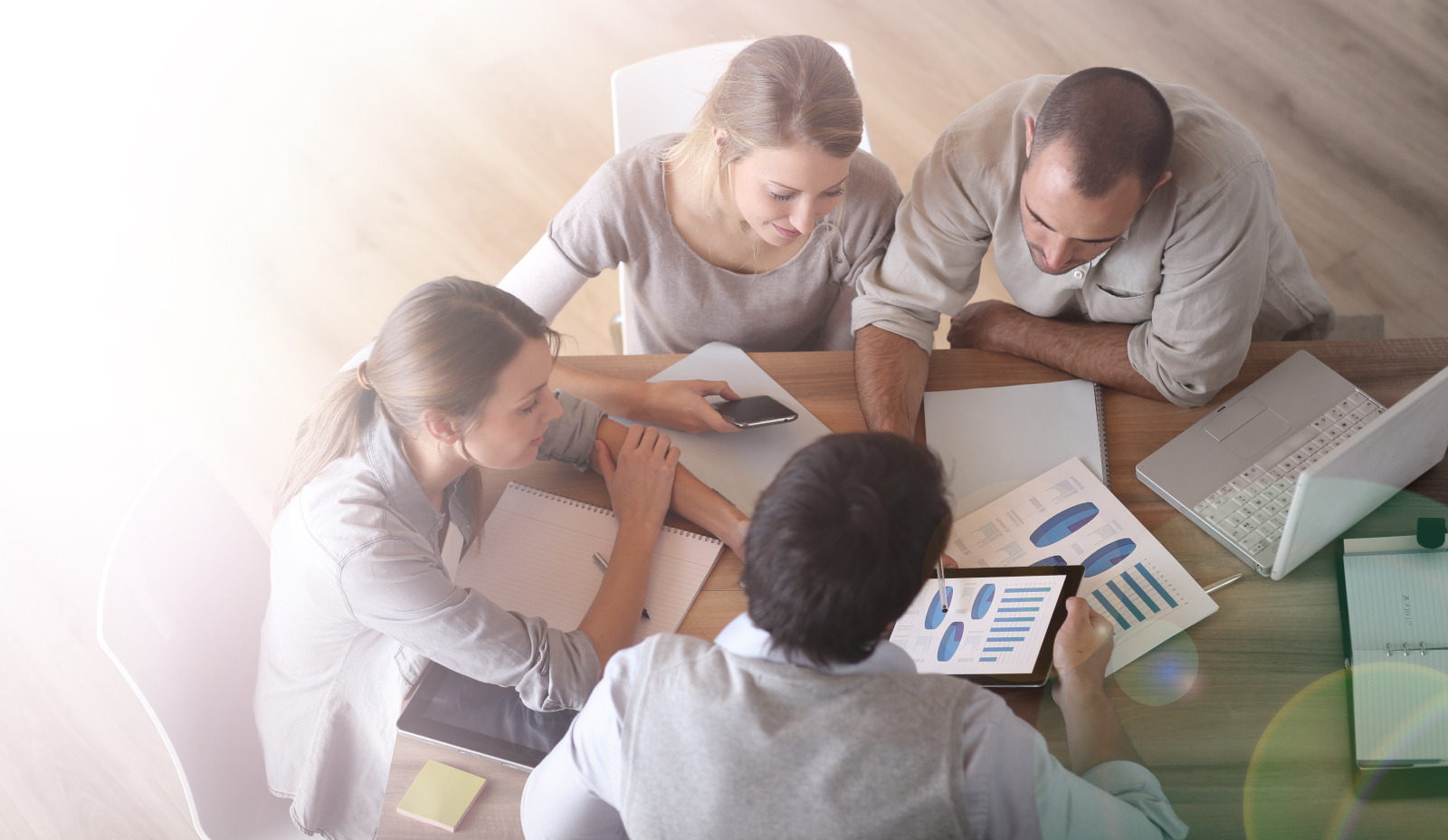divestiture - 4 people meeting