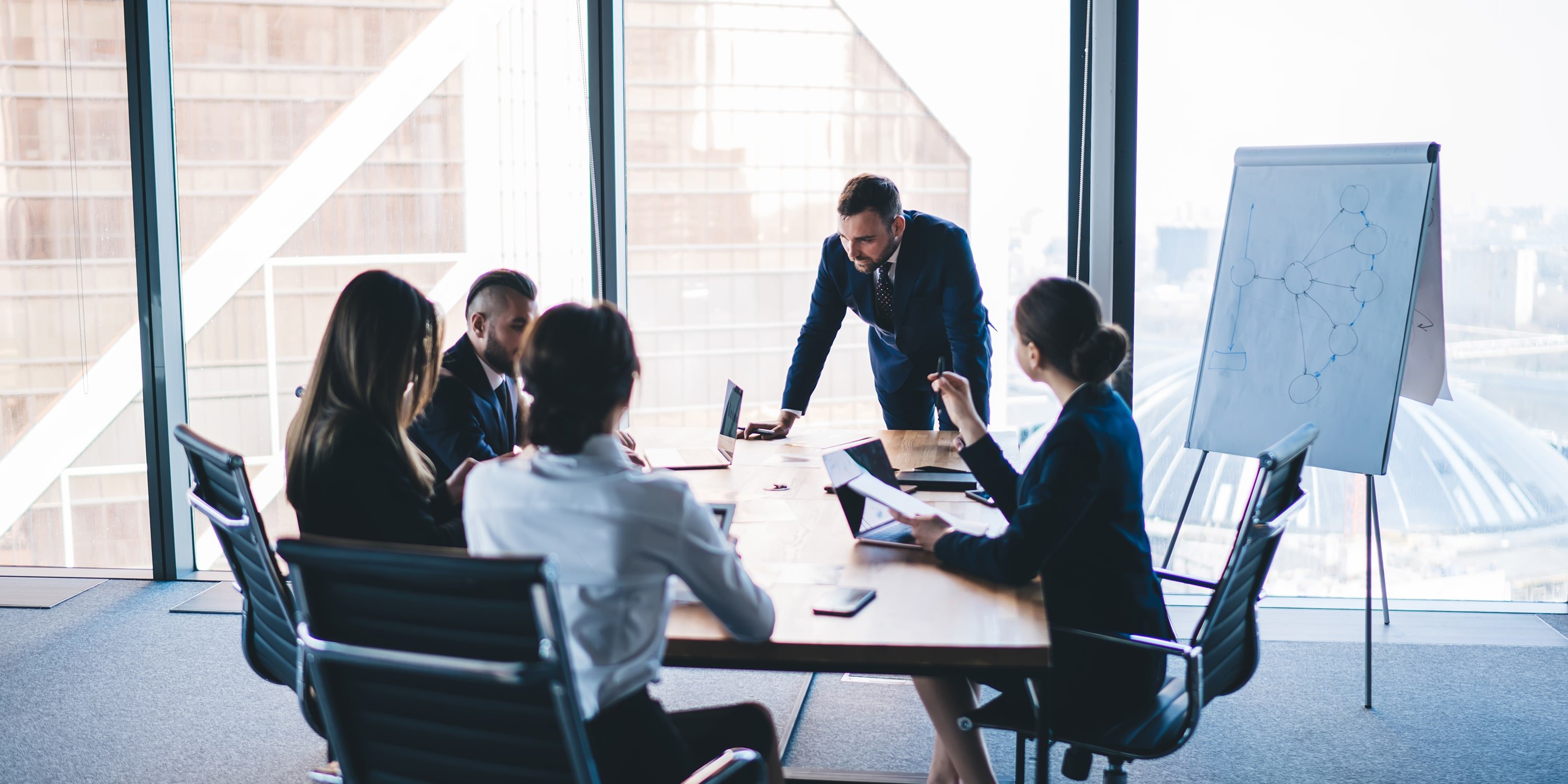 people in a meeting room discussing digital transformation at ABB and SBB