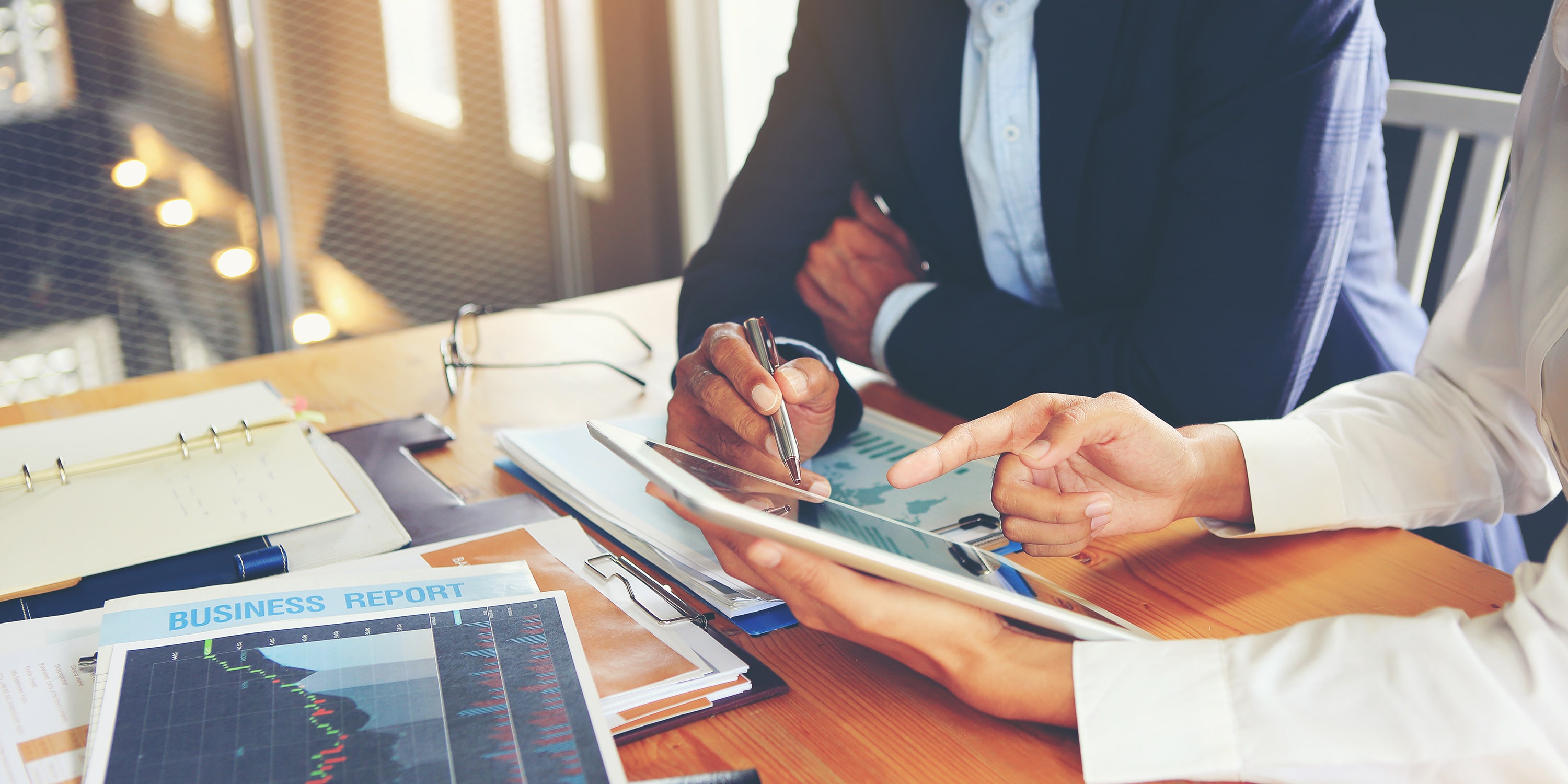 two people in a business meeting about organizational efficiency